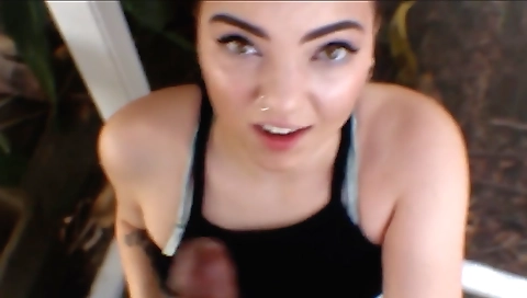 Ebony babe with a big black cock is getting oral handjob on the pool