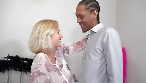 Mature hottie with a large pair of tits riding a cock