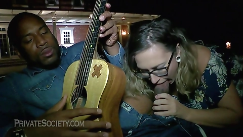 Interracial tattooed milf rides a big cock deepthroating