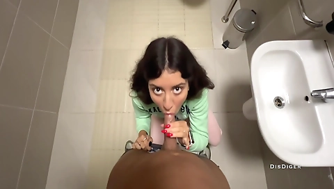 Slutty brunette in the public toilet with two dudes