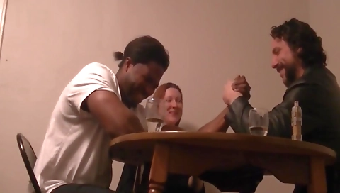 Hairy milf rides the cock of an interracial threesome