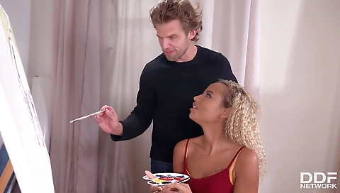 Ebony beauty with a tattooed face is getting fucked