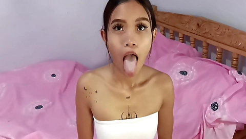 Asian babe gets a good blowjob from her white lover